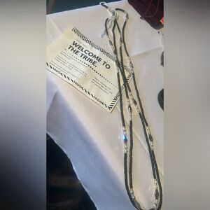 Black Beaded Waist Chain Layered With Black and Gold Bead Accents. 64 inches